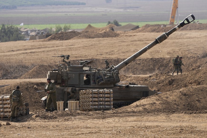 Israel offensive presses deeper into Gaza as tank seen on key road
