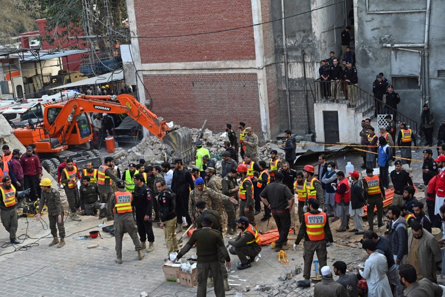 Blasts near Pakistan candidate's election office kill 22 a day before vote