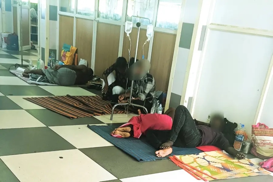 Minister defends treating patients lying on the floor