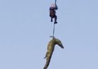 Police airlift crocodile from river on suspicion of eating missing businessman