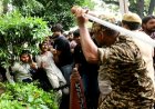 Police use tear gas to stop march on Parliament by Cockroach movement supporters