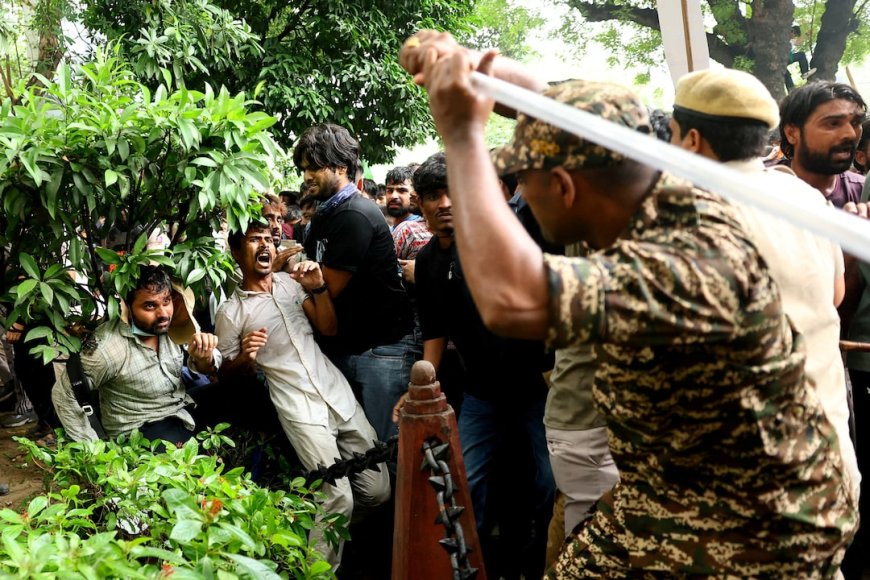 Police use tear gas to stop march on Parliament by Cockroach movement supporters